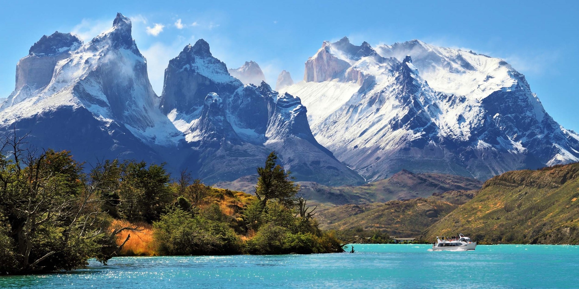 A view of a snow covered mountain with Torres del Paine National Park in the background