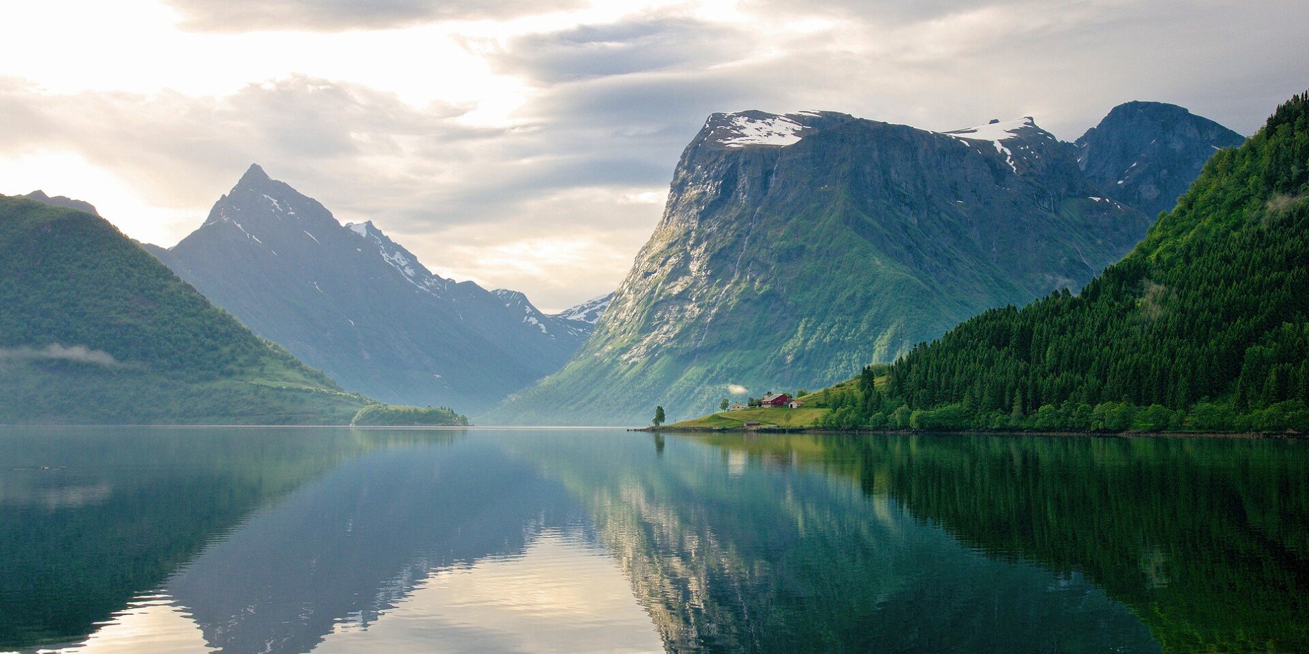 Reflections in the waters of the Hjørundfjord in Norway